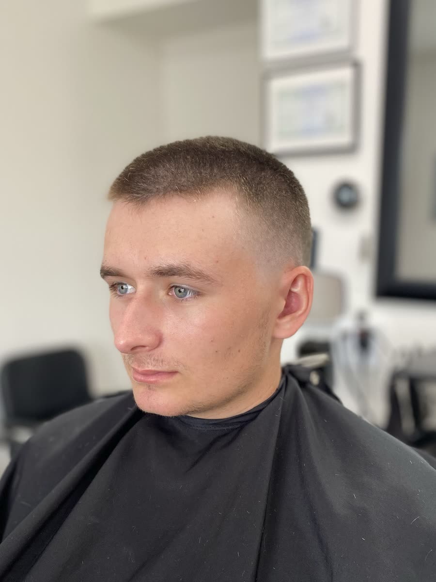 Short buzz with a skin fade